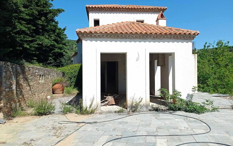 Unfinished villas with pools and views to Skopelos bay