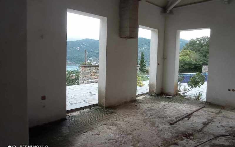 Unfinished villas with pools and views to Skopelos bay