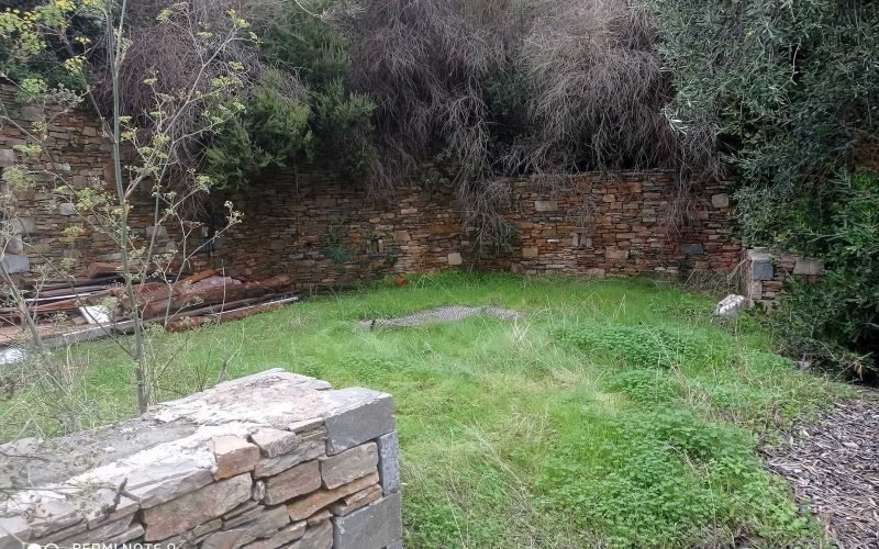 Unfinished villas with pools and views to Skopelos bay