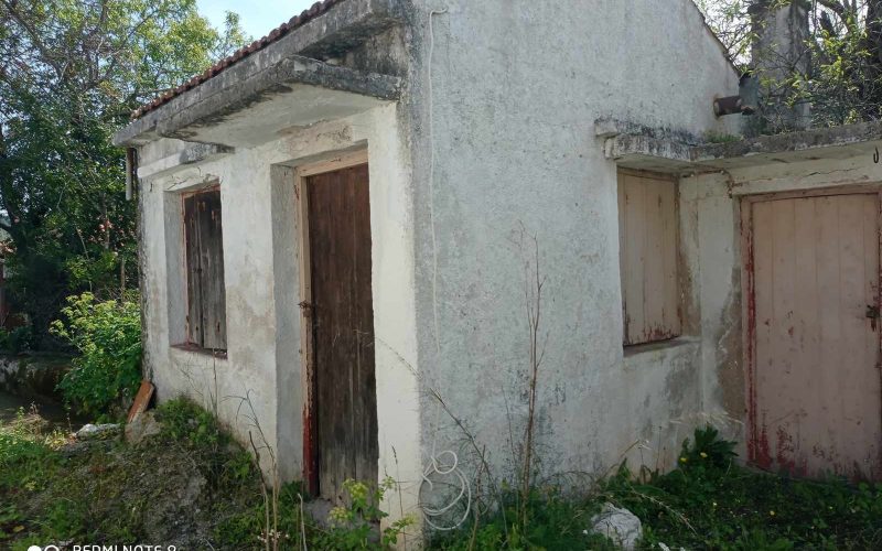 Big land with cottages to renovate close to Panormos beach small cottage