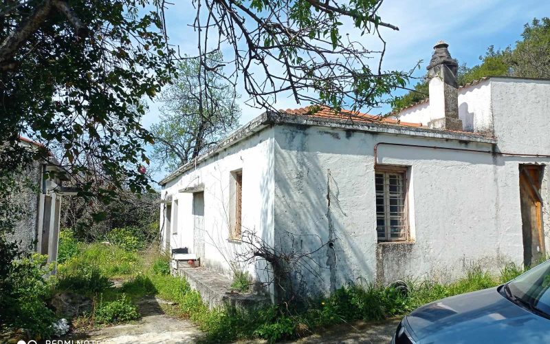 Big land with cottages to renovate close to Panormos beach Big cottage