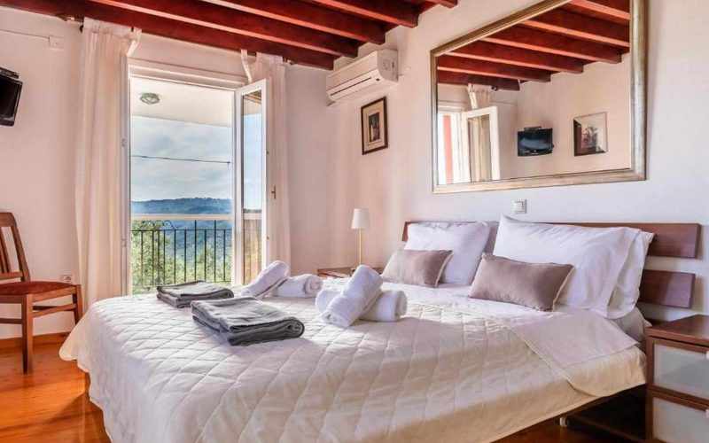 Villa Santa Marina with views to Skopelos Town and port Bedroom