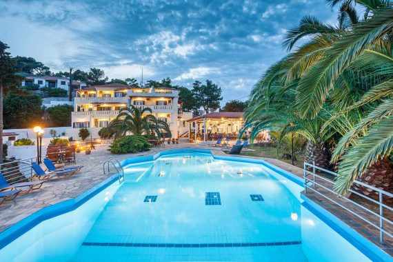 Exquisite Hotel for sale above Stafilos beach