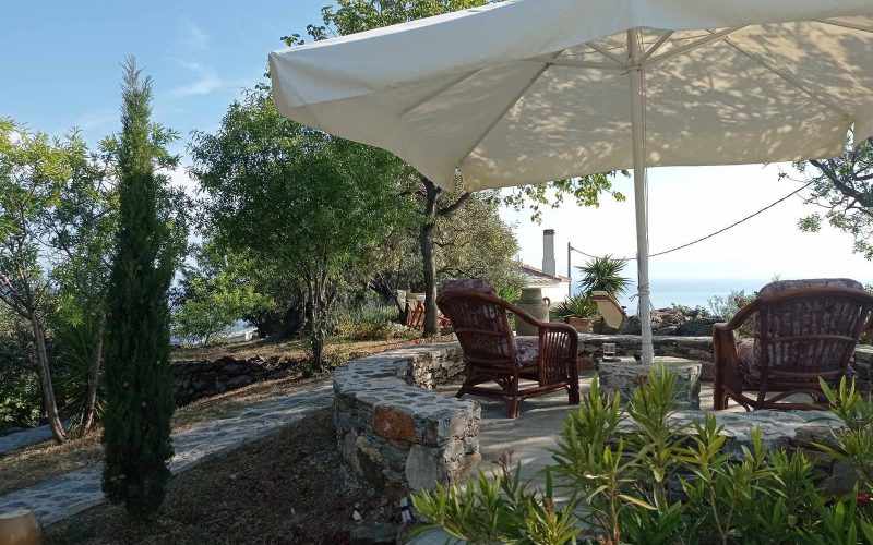 Villa in Anilio area with splendid views to the Aegean Sea Old mill seating area