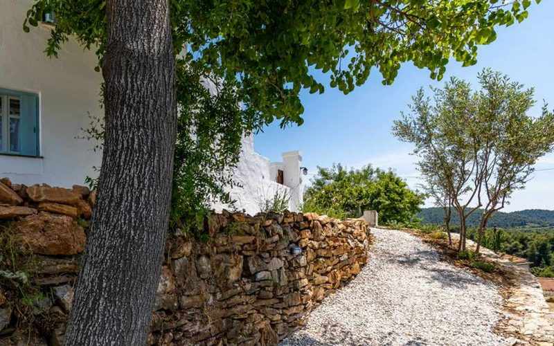 Traditional cottage in the countryside close to Panormos beach