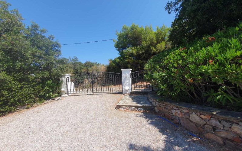 Glorious Mansion with a unique garden on Skopelos Island. Back entrance gate